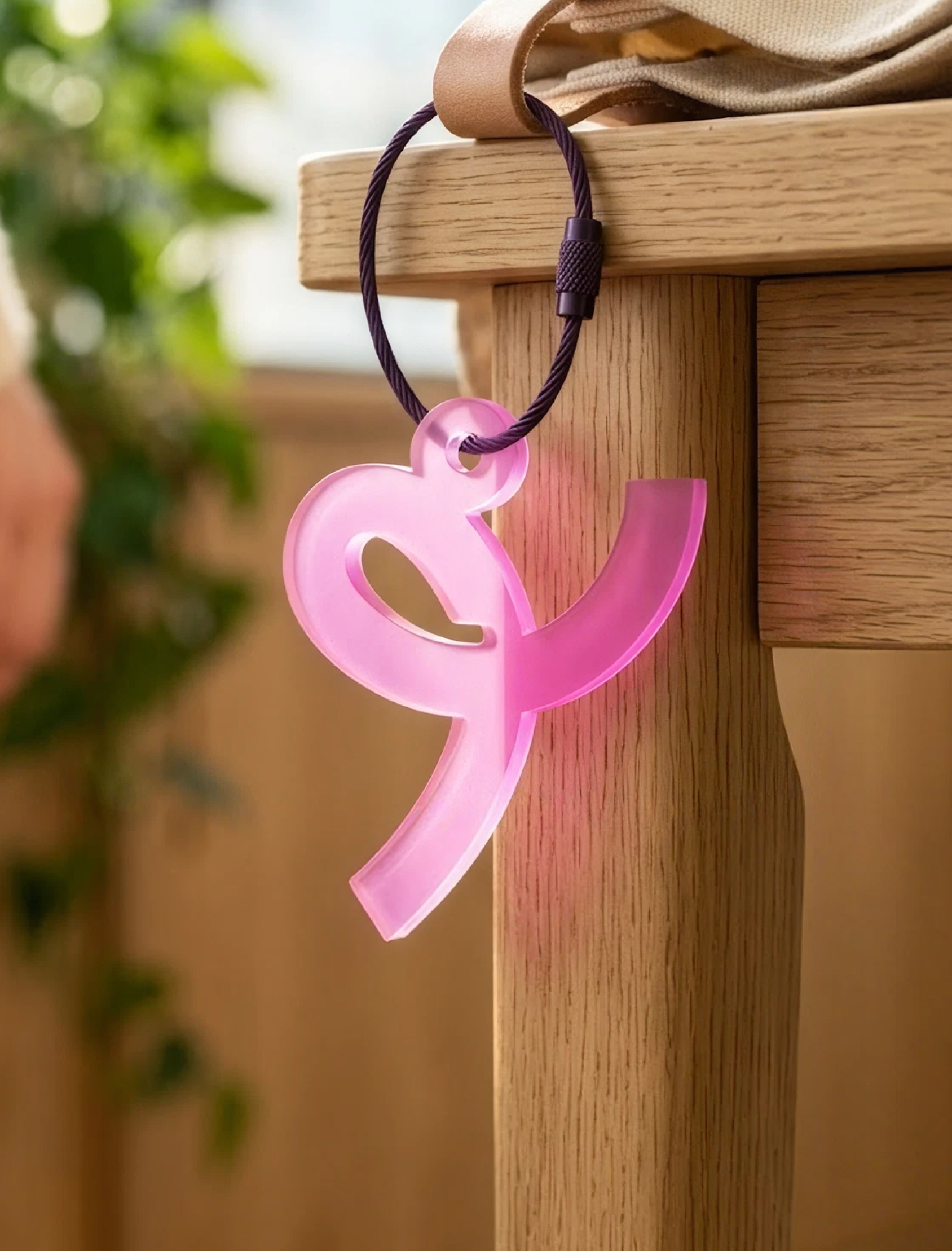 Treams pink brand symbol as a keyring